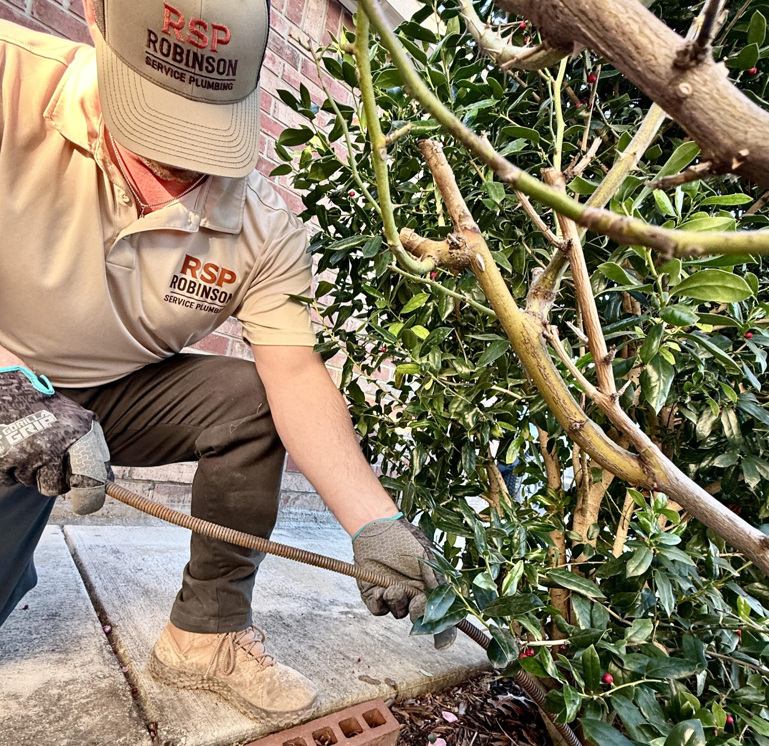 John Cameron Robinson plumber doing sewer camera inspection